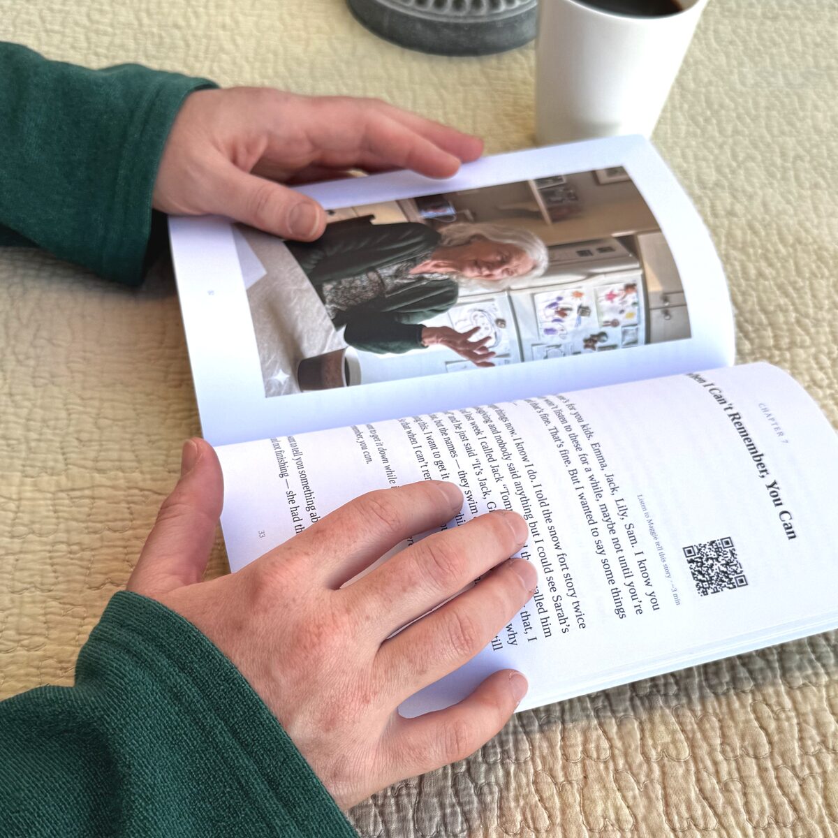 Printed memoir book held in hands